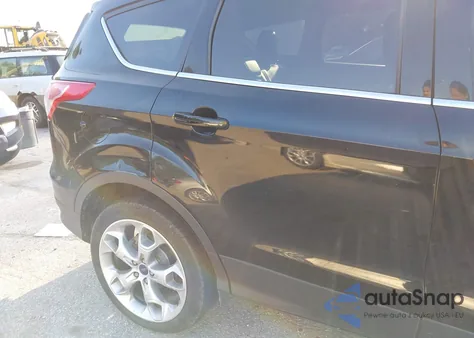 2016 Ford Escape Titanium z USA, uszkodzony, nr VIN 1FMCU9J94GUB58973